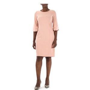 Slightly wrinkled never worn light pink sheath dress.